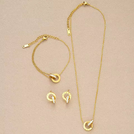 4-Piece Gold Stainless Steel Jewelry Set – Interlocking Circles & Roman Numerals. Queen D LA