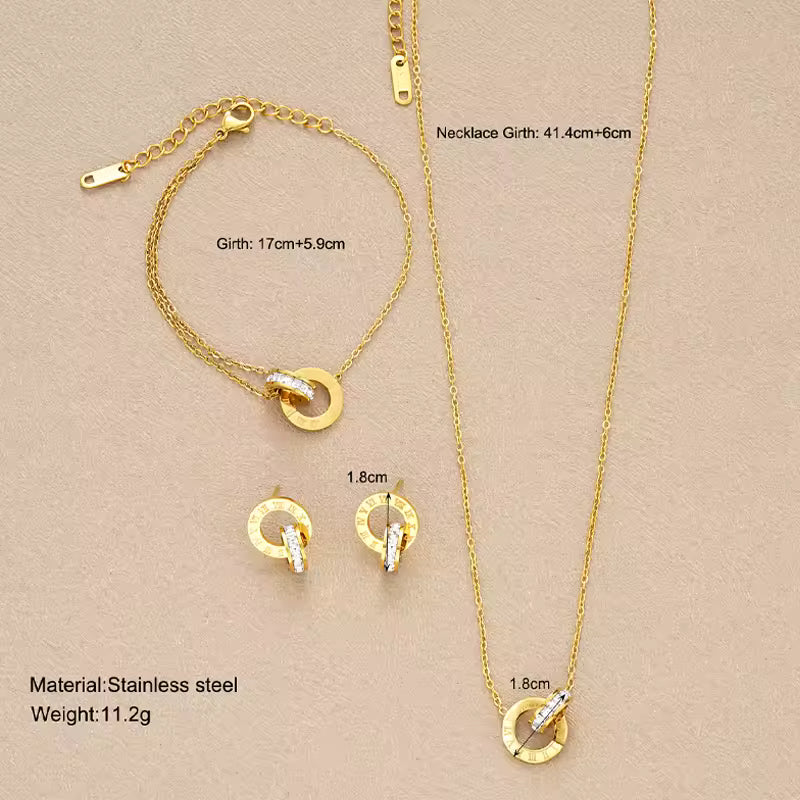 4-Piece Gold Stainless Steel Jewelry Set – Interlocking Circles & Roman Numerals. Queen D LA